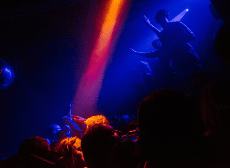 Lasers lighting up the crowd at Corsica Studios night club