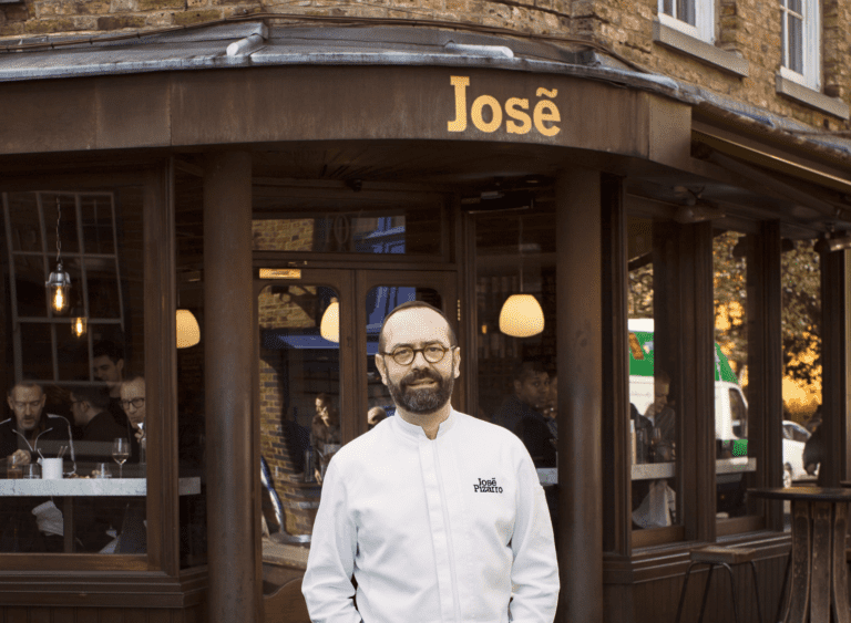 Owner stood in front of tapas restaurant