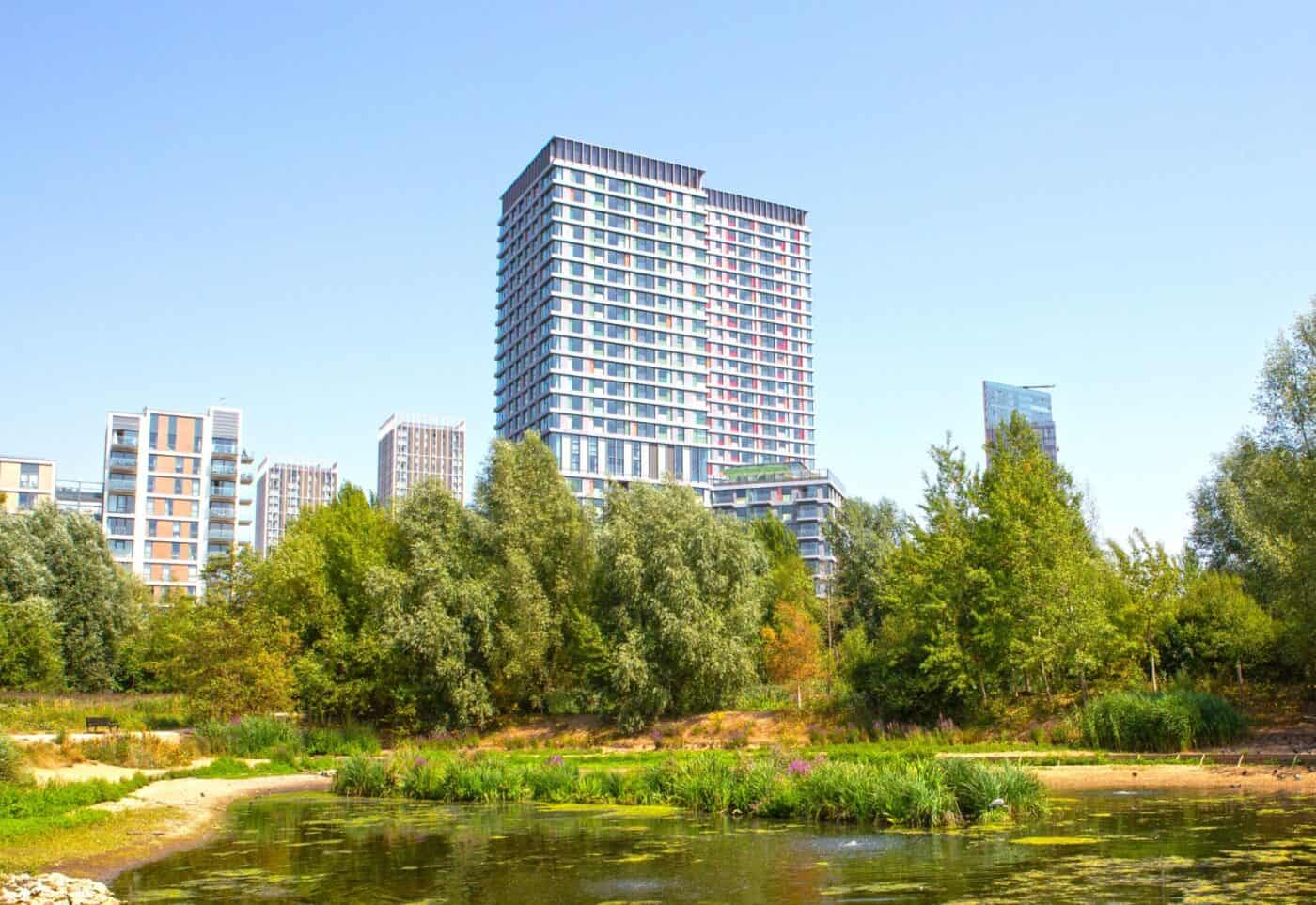 View of Hightail and Skylark Point Portlands Place apartment buildings from the green Wetlands