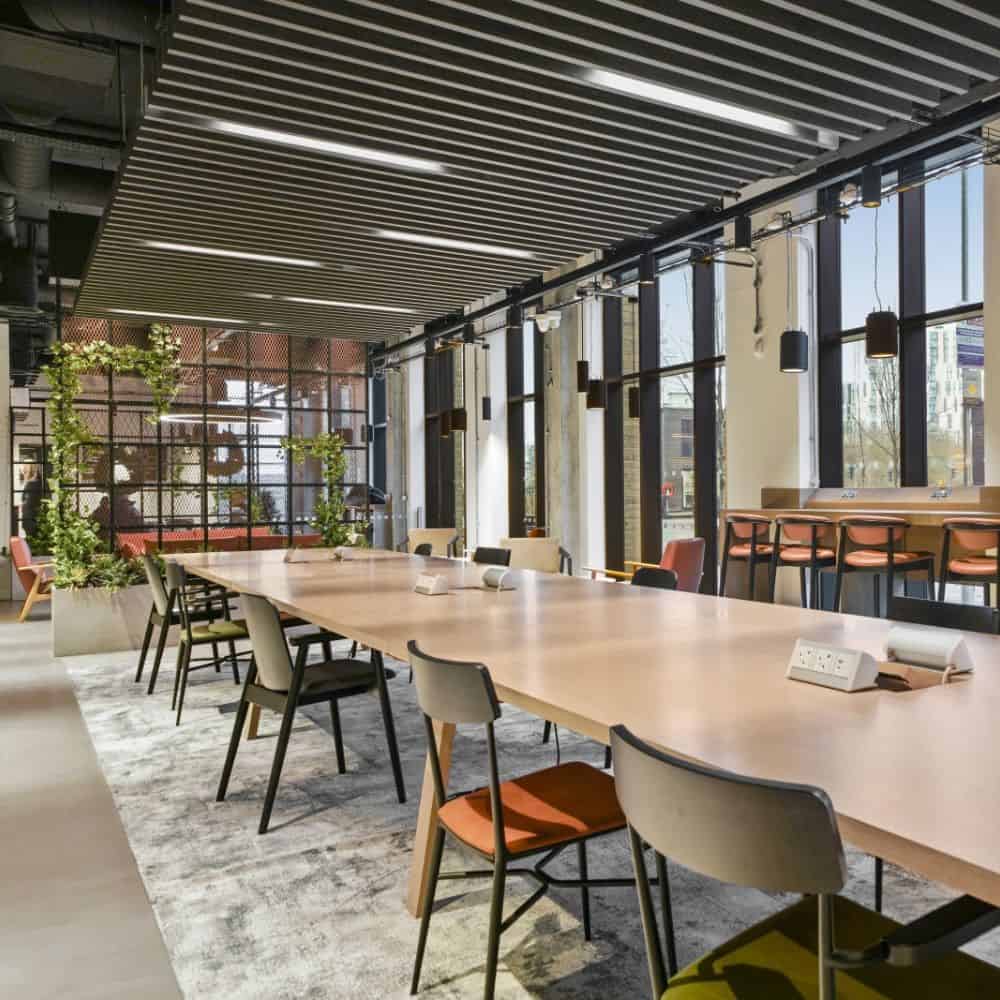 Coworking hot desks in The Lock communal area at New Maker Yards